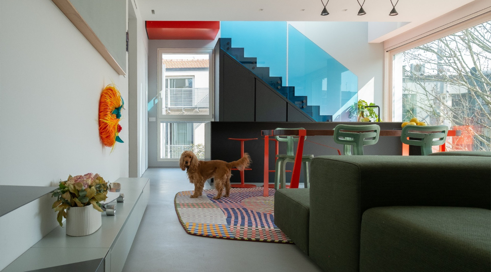 An interior renovation apartment in Milan full of color